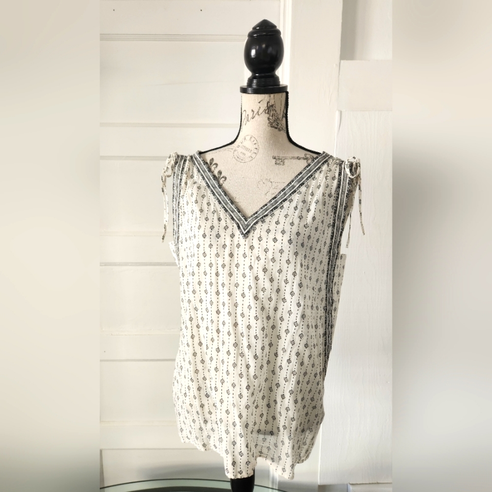 Women's cotton, sleeveless   v-neck blouse, medium